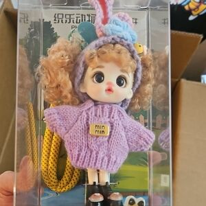 Cute Curly-Haired Doll in Lavender Knit Outfit